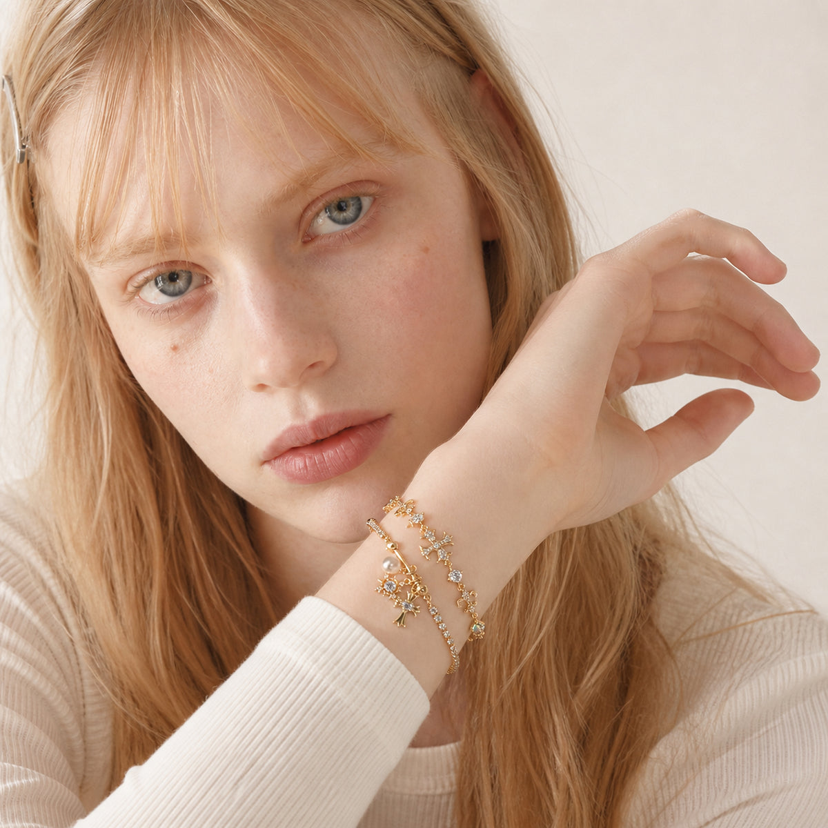 Pearl Snowflake & Cross Bracelet worn by model