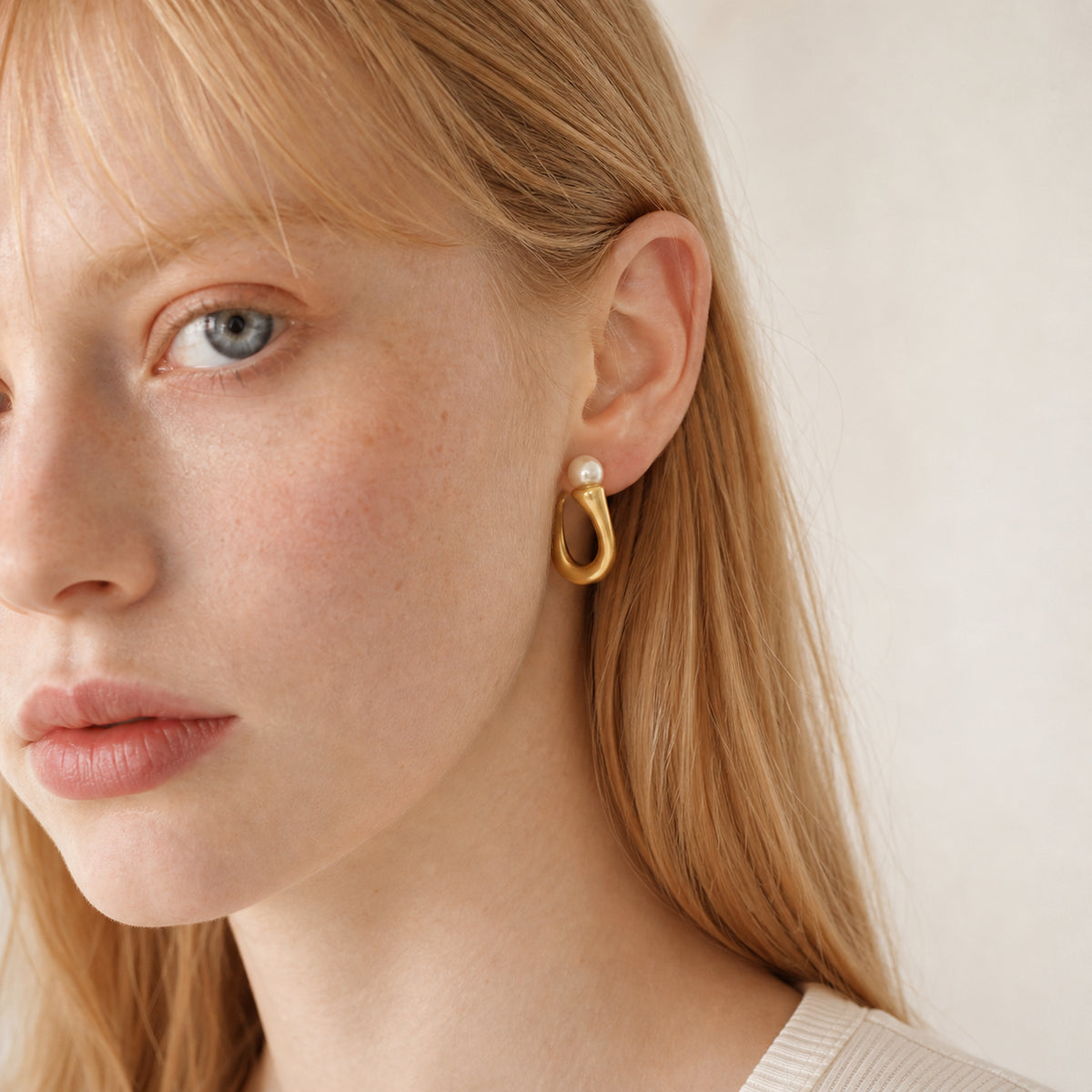 Irregular Pearl Drop Earrings worn by model
